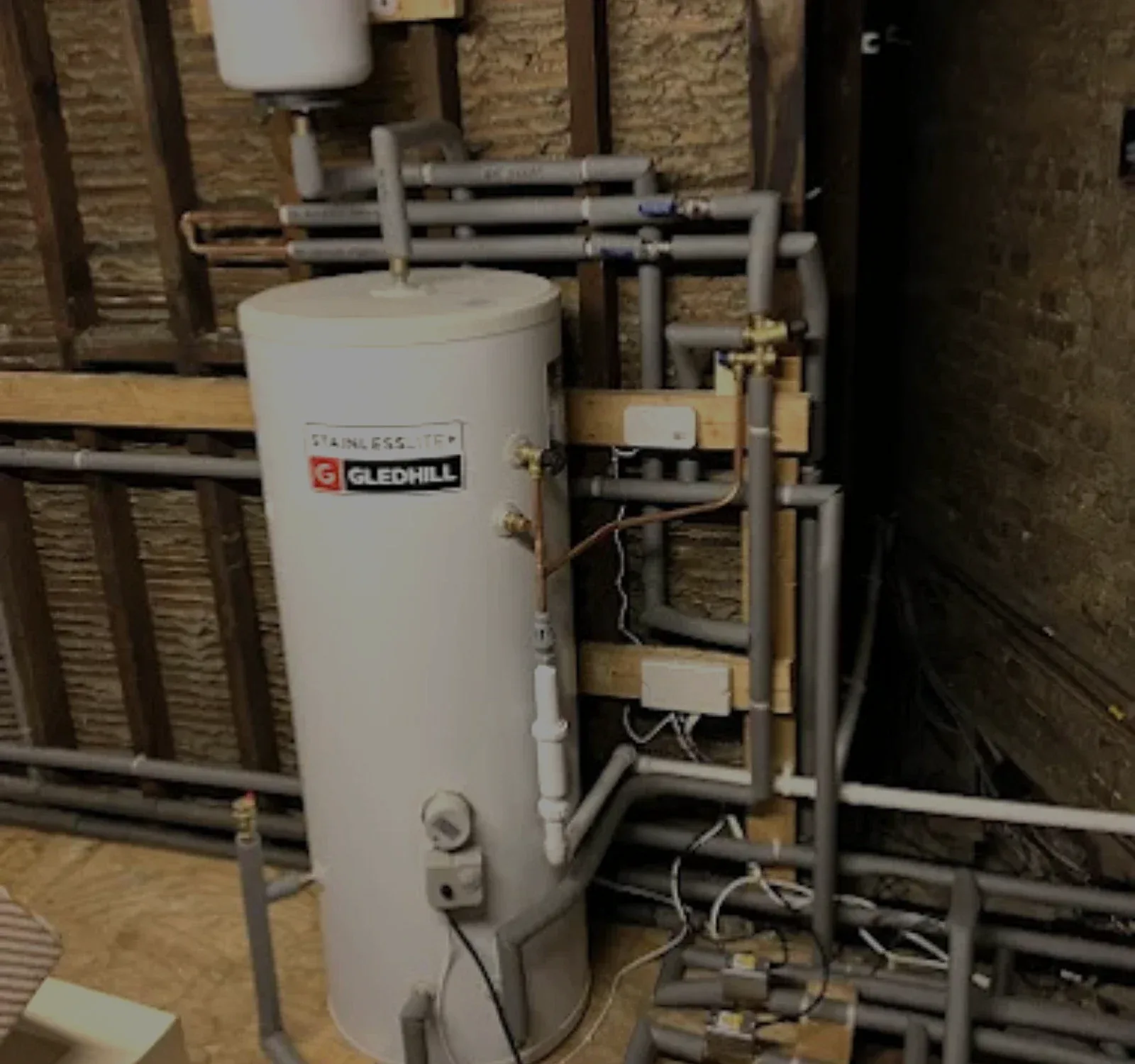 Unvented hot water cylinder assessed during a boiler repair