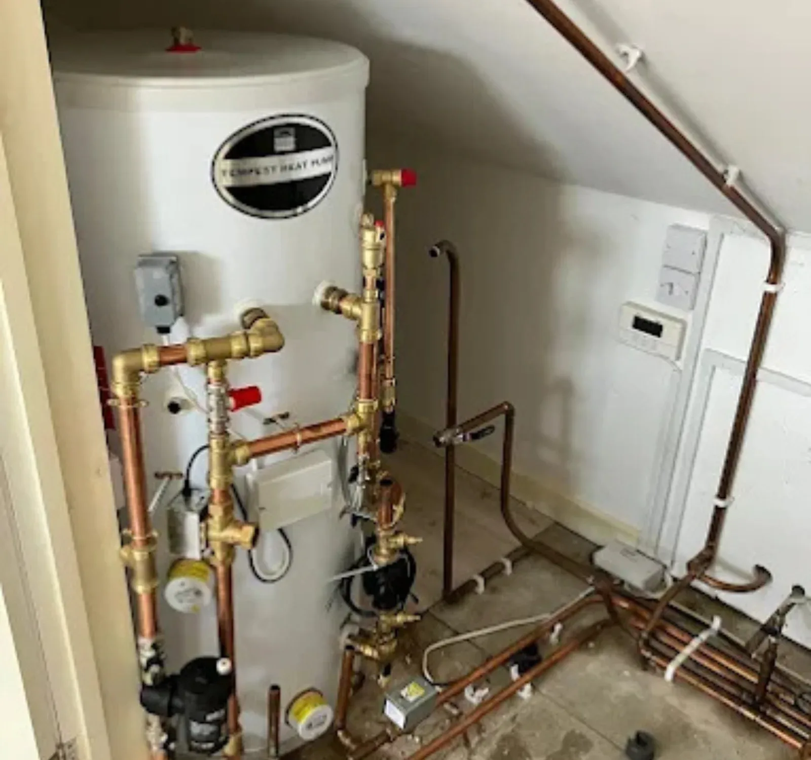 Unvented cylinder and copper pipework inspected during a service