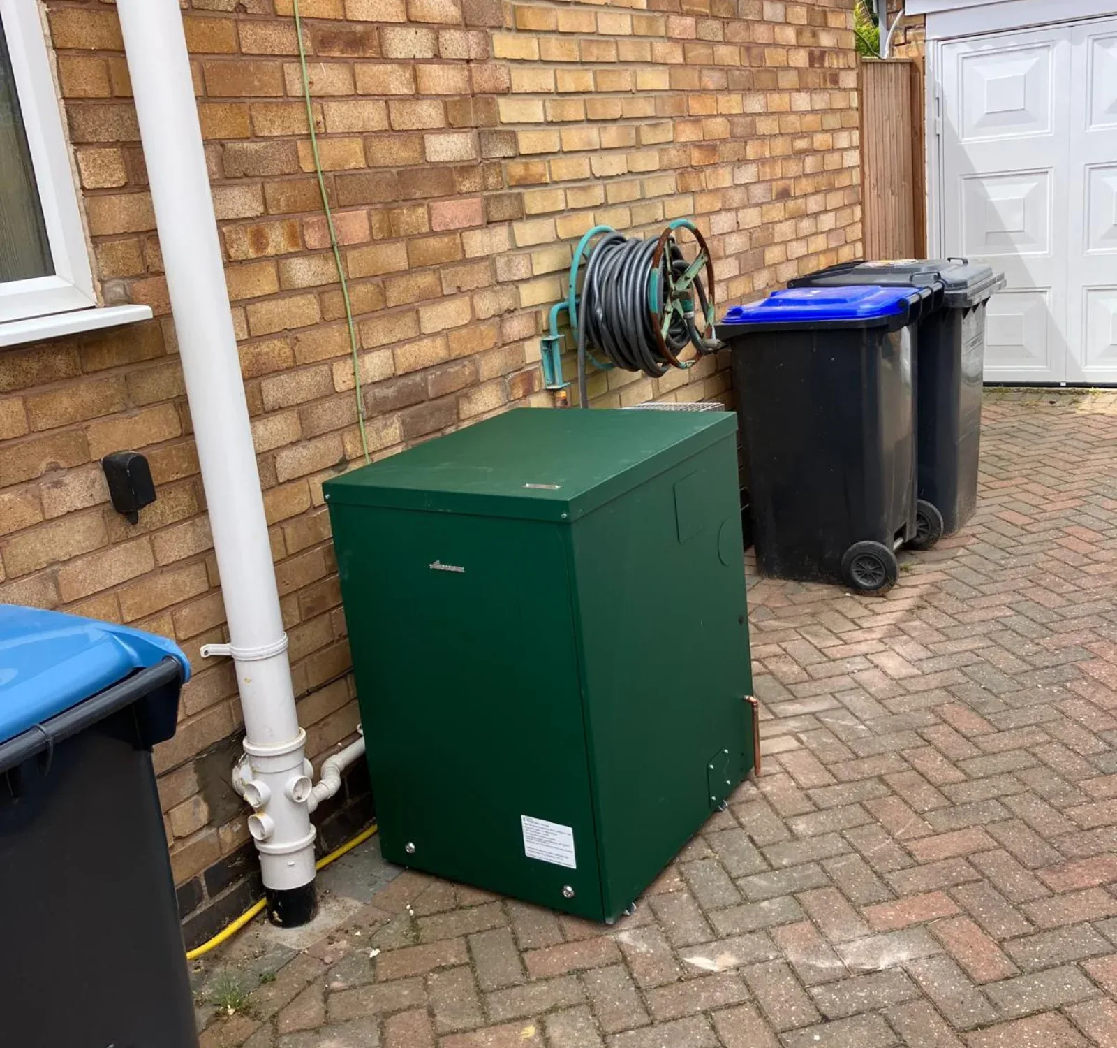 Green Worcester external oil boiler fitted at a Leicestershire property