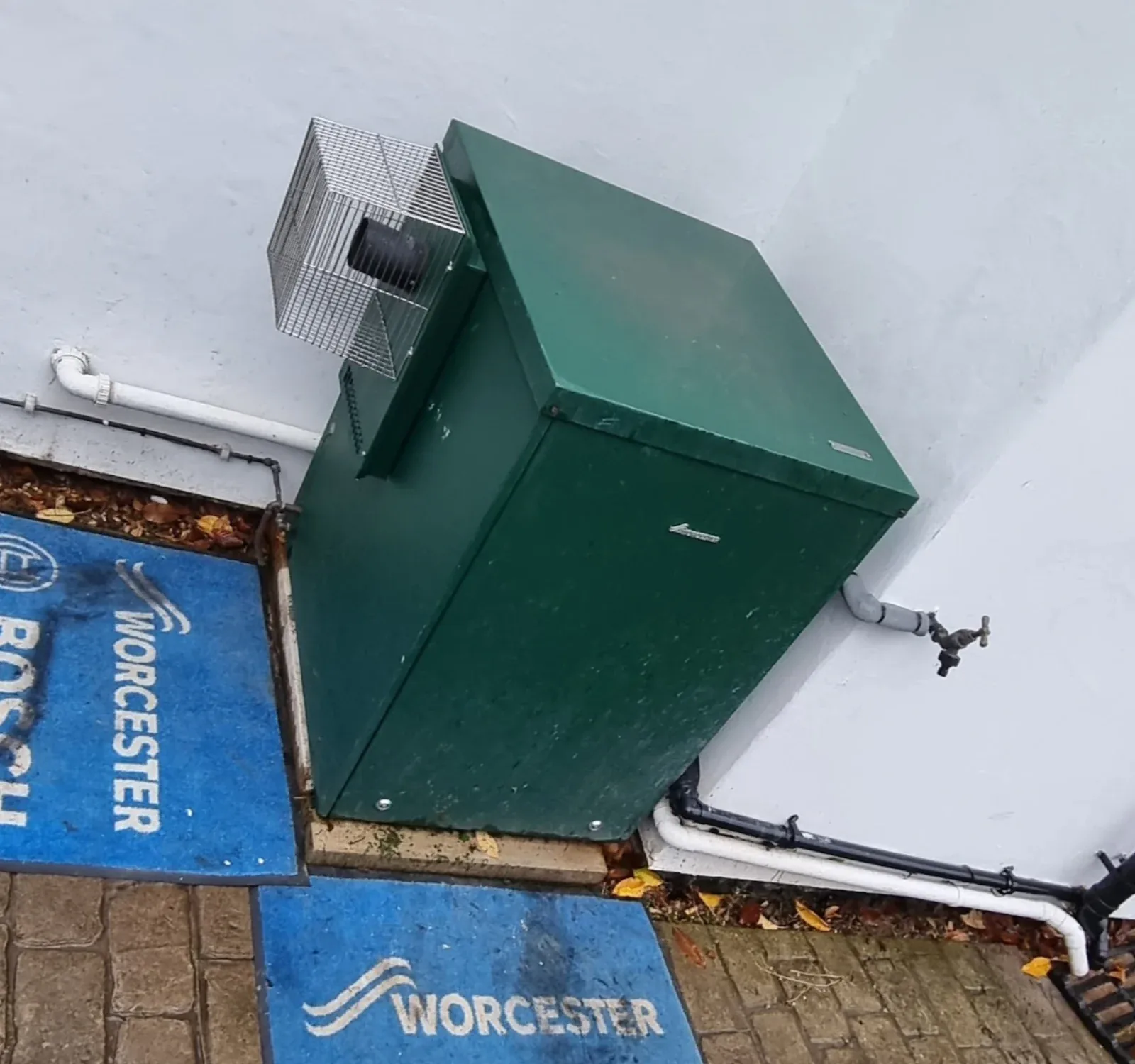 Top-down view of a newly fitted external oil boiler