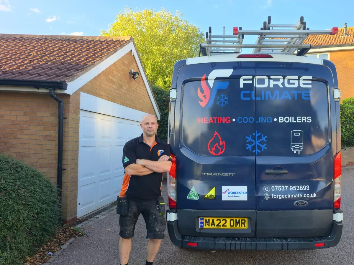 Carl Southam with the Forge Climate van showing Gas Safe, OFTEC and Worcester Bosch accreditations